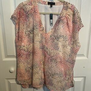 Sleeveless breezy dressy top.